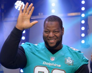 Oct 3, 2015; London, United Kingdom; Miami Dolphins defensive tackle Ndamukong Suh (93) waves to the crowd at the 2015 NFL International Series Fan Rally at Trafalgar Square. Mandatory Credit: Kirby Lee-USA TODAY Sports